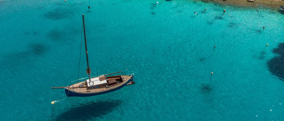 Mali Lošinj - Tranquil Cove with Clear Blue Waters and Lush Greenery